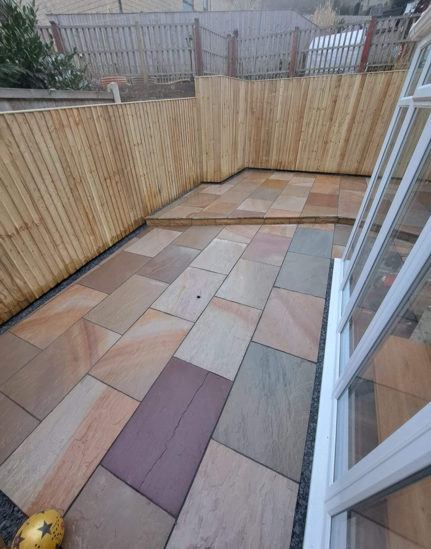 Indian sandstone patio in mixed tones
