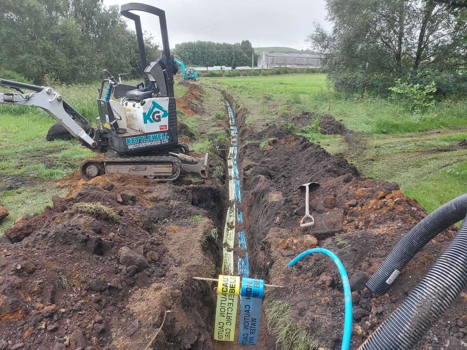 Excavator carrying out groundworks